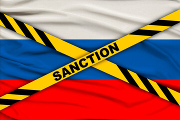 word sanctions on Yellow Tape against the background of national flag of Russia, concept of...