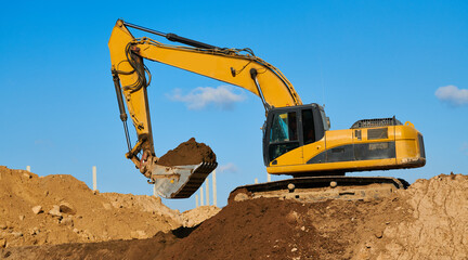 excavator at sandpit during earthmoving works