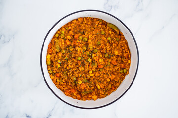 vegan red lentil dahl with mixed veggies, healthy plant-based food