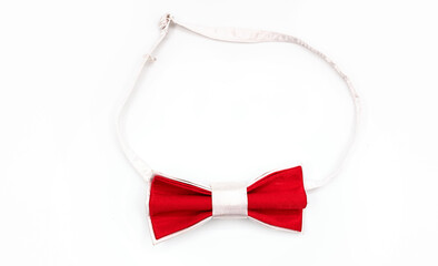 Close up of red bow tie isolated on white background - Powered by Adobe