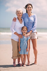 The ladies in my life. Portrait of a woman with her daughter and mother at the beach.