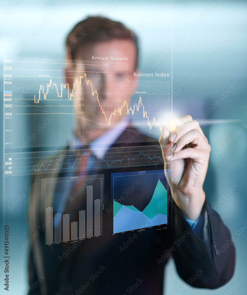 Poster touching the future. cropped shot of a handsome young businessman using a digital interface.