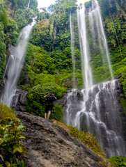 Fototapeta premium scenic view of sekumpul waterfall in bali indonesia