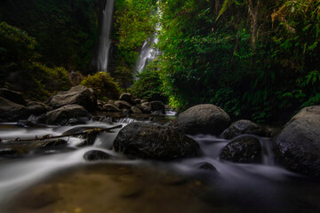 Naklejka na ściany i meble scenic view of sekumpul waterfall in bali indonesia