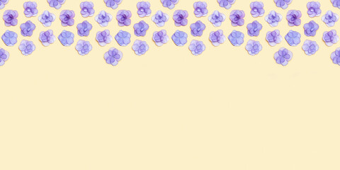 Natural Hydrangea violet flower, minimal floral frame on beige background. Layout with fresh...
