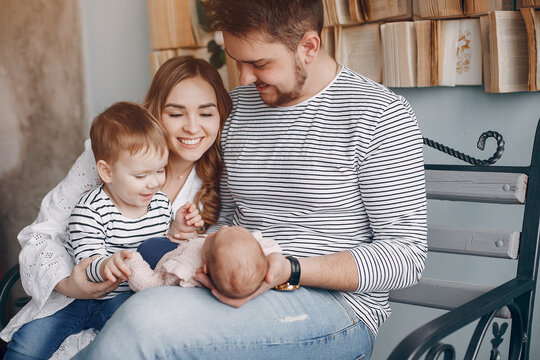 Cute familly sitting at home