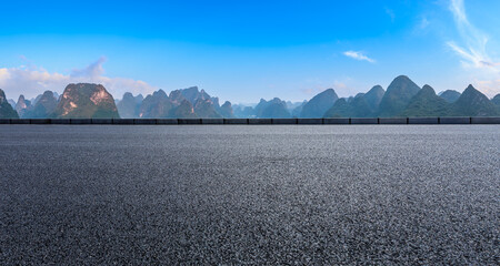 Asphalt highway and mountain natural scenery under blue sky in summer
