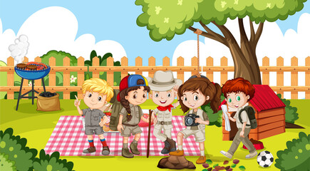 Obraz na płótnie Canvas Boys and girls picnic in garden
