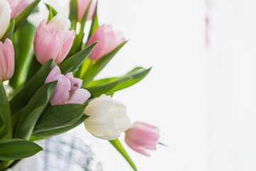 Fresh tulip flower bouquet over blurred background, nature background, wedding day decoration,...
