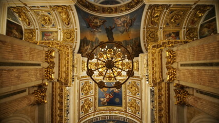 Fototapeta na wymiar Saint Petersburg, Russia - October 24, 2021: interior of the Cathedral of St. Isaac of Dalmatia. Dome inside and ceiling. It is one of the most beautiful cathedrals in St. Petersburg.