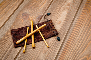 Four bamboo sticks to massage the face and other parts of the body.