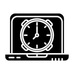 laptop and alarm clock