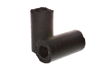 pressed charcoal isolated on white background