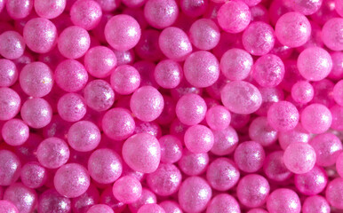 Small sweet pink balloons as a background.