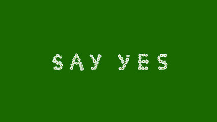 Words SAY YES made from flowers on green background. Minimal optimistic concept. - obrazy, fototapety, plakaty