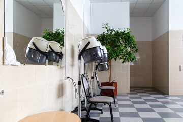 Devices for drying hair in a beauty salon.