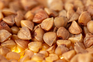Close-up of buckwheat groats as background.