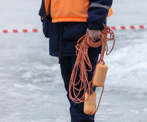 Lifeguard on the ice of the lake