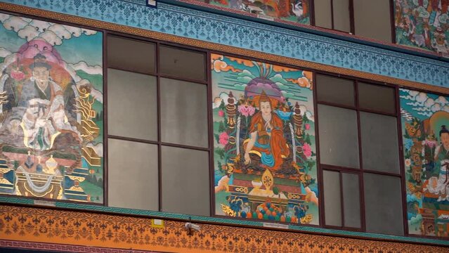 Wall paintings of different spiritual icons in a Buddhist monastery - mosaics on walls  holy place  beautiful artwork.  Interior of the temple with ancient paintings - historic temple  local culture