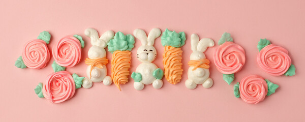 Fototapeta na wymiar Sweets, pastry, gingerbread cookies for Easter table. Easter cute rabbit bunny, carrot on pink background top view copy space, spring seasonal holiday banner for your site, flyer, coupon