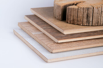 Laminate. Laminate boards and wood. Natural wood and laminate flooring.