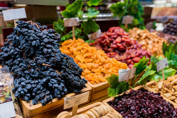 Close up of display with traditional turkish delights, dried fruits and nuts at Egyptian Bazaar. Best delicious turkish foods to try on trip to Istanbul. Selective focus