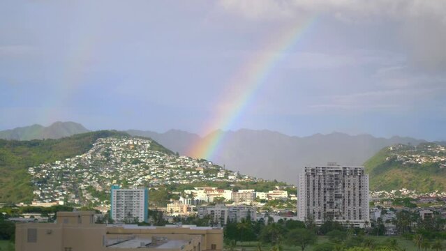Beautiful rainbow above Honolulu Hawaii in 4k slow motion 60fps