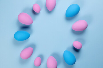 Pink Easter eggs on a blue background