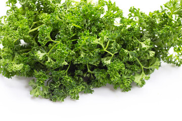 Fresh parsley on white background.