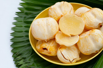 Toddy palm on green leaves