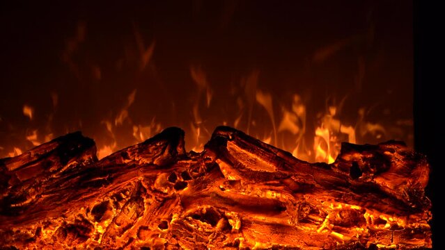 Footage of electronic artificial fireplace in stylish apartment.Cozy interior in loft style for romance at home. 