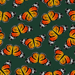 Seamless vector pattern with monarch butterflies. Contemporary composition for print. 