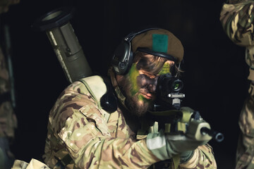 Decisive aim of a trained soldier eye fully loaded. High quality photo