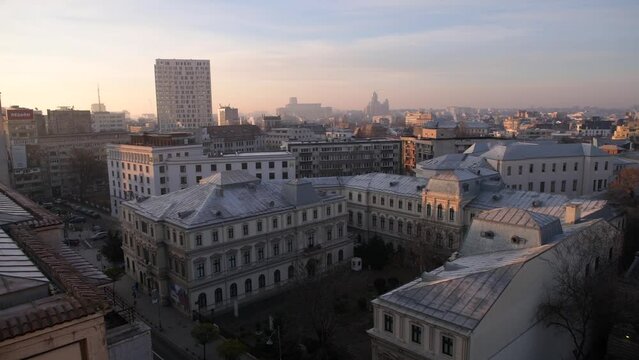 Bucharest from above during a winter sunrise. 4k video with the main landmarks from Calea Victoriei in Bucharest, Romania, filmed in the morning.