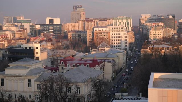 Bucharest from above during a winter sunrise. 4k video with the main landmarks from Calea Victoriei in Bucharest, Romania, filmed in the morning.
