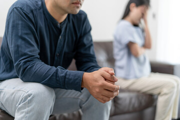 Asian man and woman are disappointed and saddened after an argument with wife. Asian couples are having family problems resulting in divorce. Lover broken and Love problem