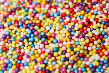 Fototapeta na wymiar Colorful balls background, close-up. Multi colored balls