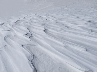Fototapeta na wymiar snow patterns formed by heavy storms