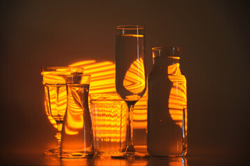 refraction of light in glass vessels filled with water
