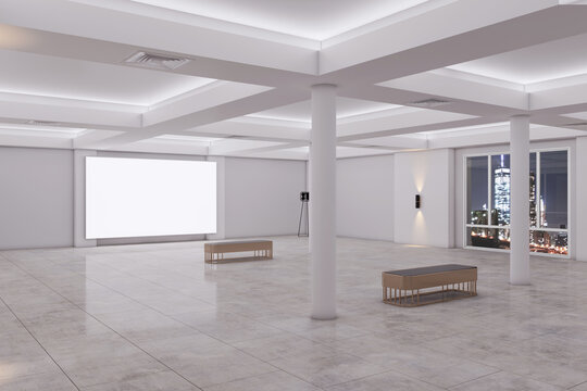 Contemporary spacious concrete exhibition interior with empty white mock up poster on wall, windows and night city view. Gallery concept. 3D Rendering.