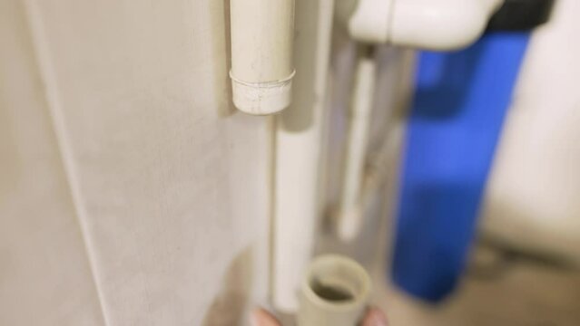 Installation of plastic pipes using welding machine.