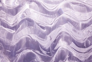 Liquid gel cosmetic smudge purple background