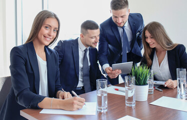 business woman with her staff, people group in background at modern bright office indoors