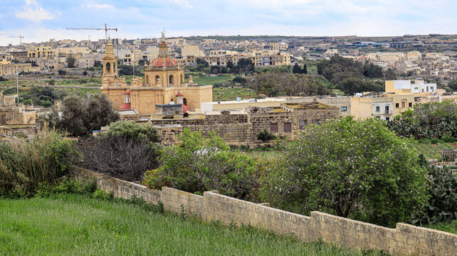 munxar church and village on the Mediterranean island
of Gozo in the Maltese archipelago.