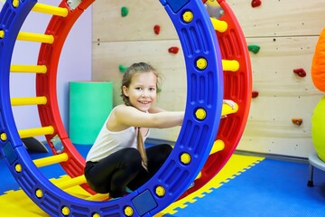 an autistic girl is being treated in a center by a psychiatrist, runs forward, one way out, super...