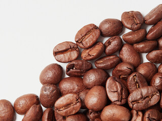 Coffee beans isolated on white background with copyspace for text. Coffee background or texture concept.