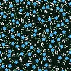 Seamless vintage pattern. Small blue and white  flowers, green leaves. black background. vector texture. fashionable print for textiles, wallpaper and packaging.