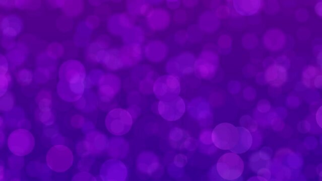Motion graphics. Eggplant colored astract background with spots in bokeh
