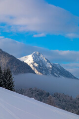 Fototapeta premium Sunny winter landscape with snowy alpine peaks and snowy nature. Dachstein Glacier, Styria, Austria