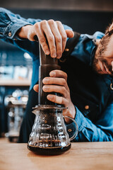 Drip method of brewing coffee through a paper filter - a vintage brewing method for maximum preservation of aroma and taste